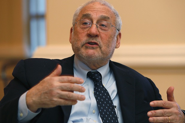 Nobel Laureate in economics and former World Bank chief Stiglitz speaks to media after his lecture "The Price of Inequality" at the Center for The New Economy Annual Conference at a hotel in San Juan